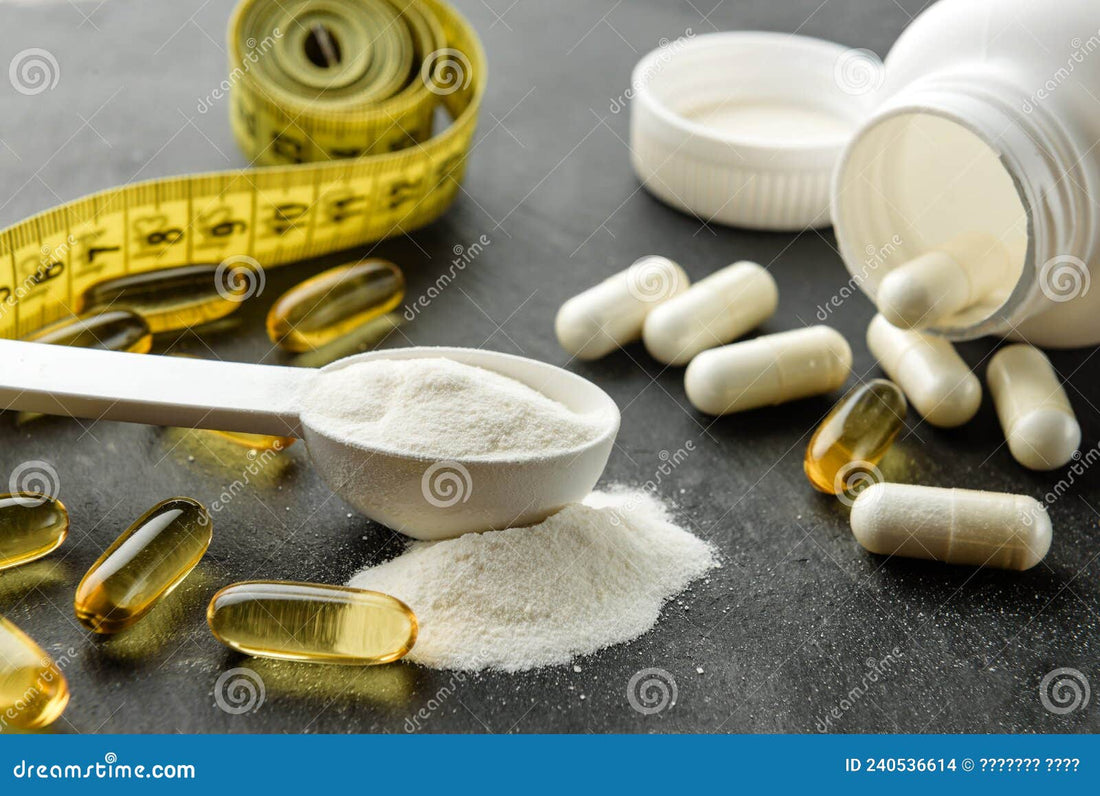 A white measuring spoon filled with creatine powder sits beside several capsules and tablets, with a tape measure in the background.